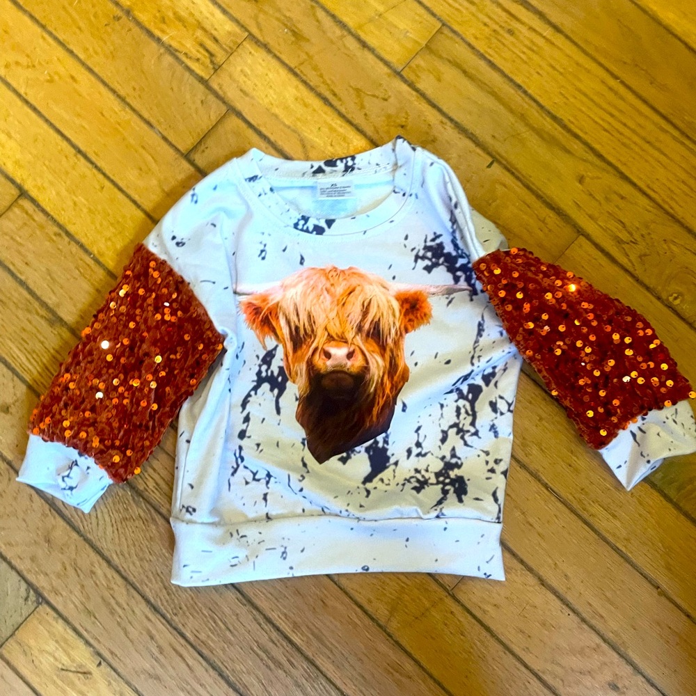 New 2t cow top